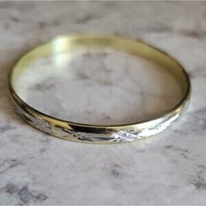 Gold and engraved silver bracelet